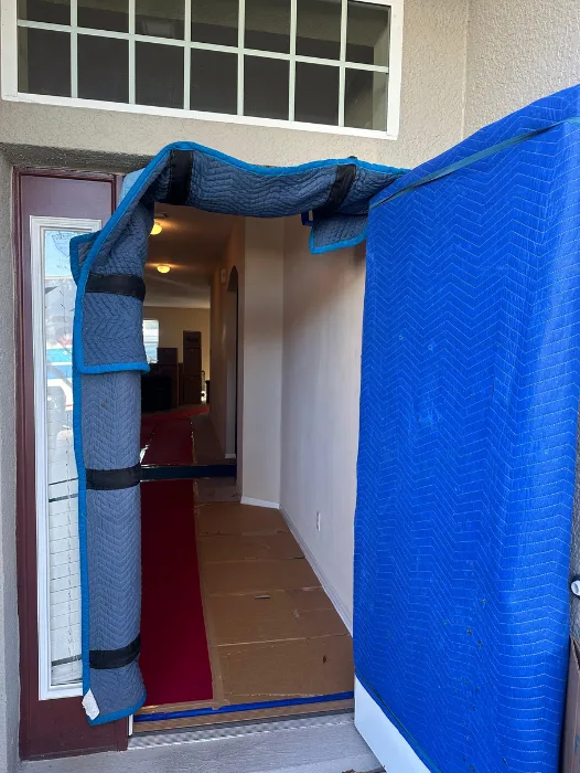 Protective floor covering placed along high-traffic areas in home